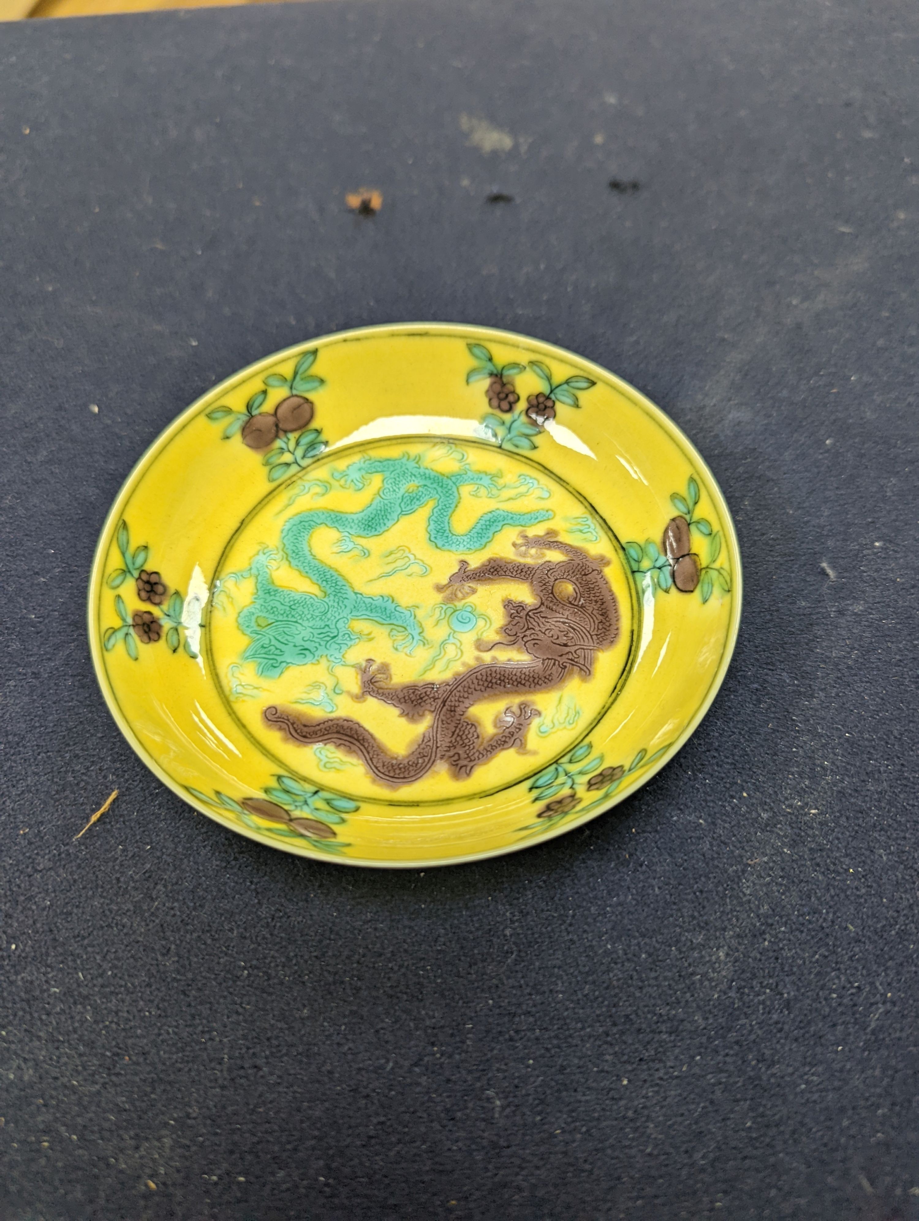 A pair of Chinese yellow, green and aubergine dragon dishes, Guangxu marks, 10cm.